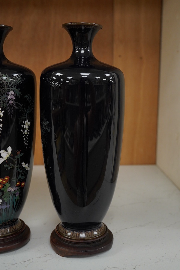 A pair of Japanese silver wire cloisonné enamel vases, Meiji period, wood stands, 18cm high